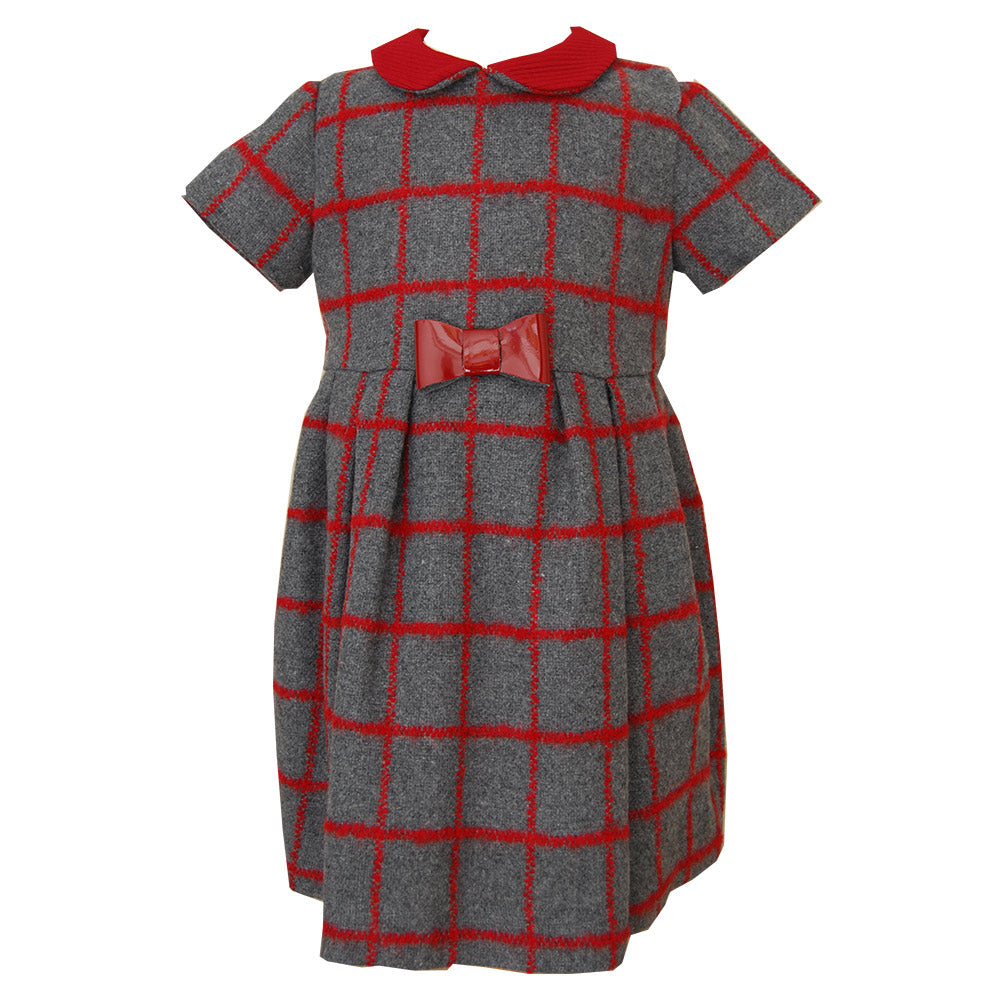 
  Dress from the Ambarabà girl's clothing line with checks in red tones. Collar
  In striped pla...