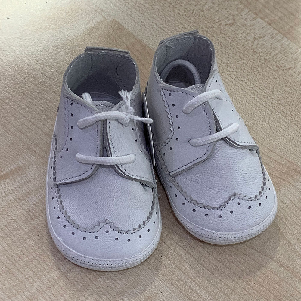 
  Shoes from the Ambarabà children's clothing line, in very soft materials and
  with craftsmans...