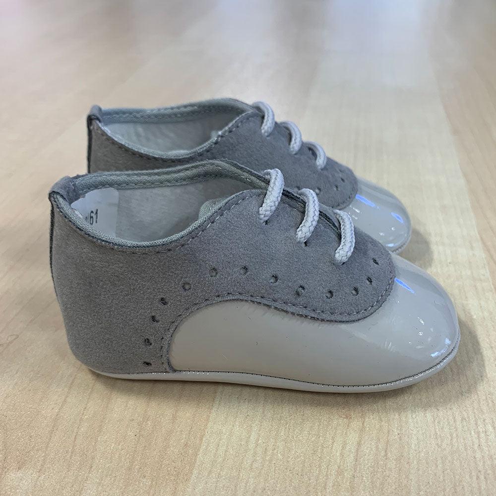 
  Shoes from the Ambarabà children's clothing line, in very soft materials and
  with craftsmans...