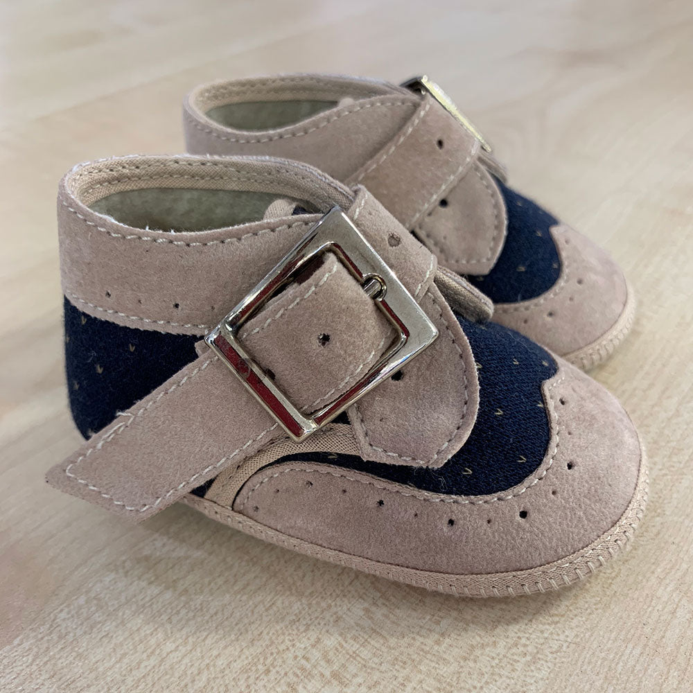 
  Shoes from the Ambarabà children's clothing line, in very soft materials and
  with craftsmans...