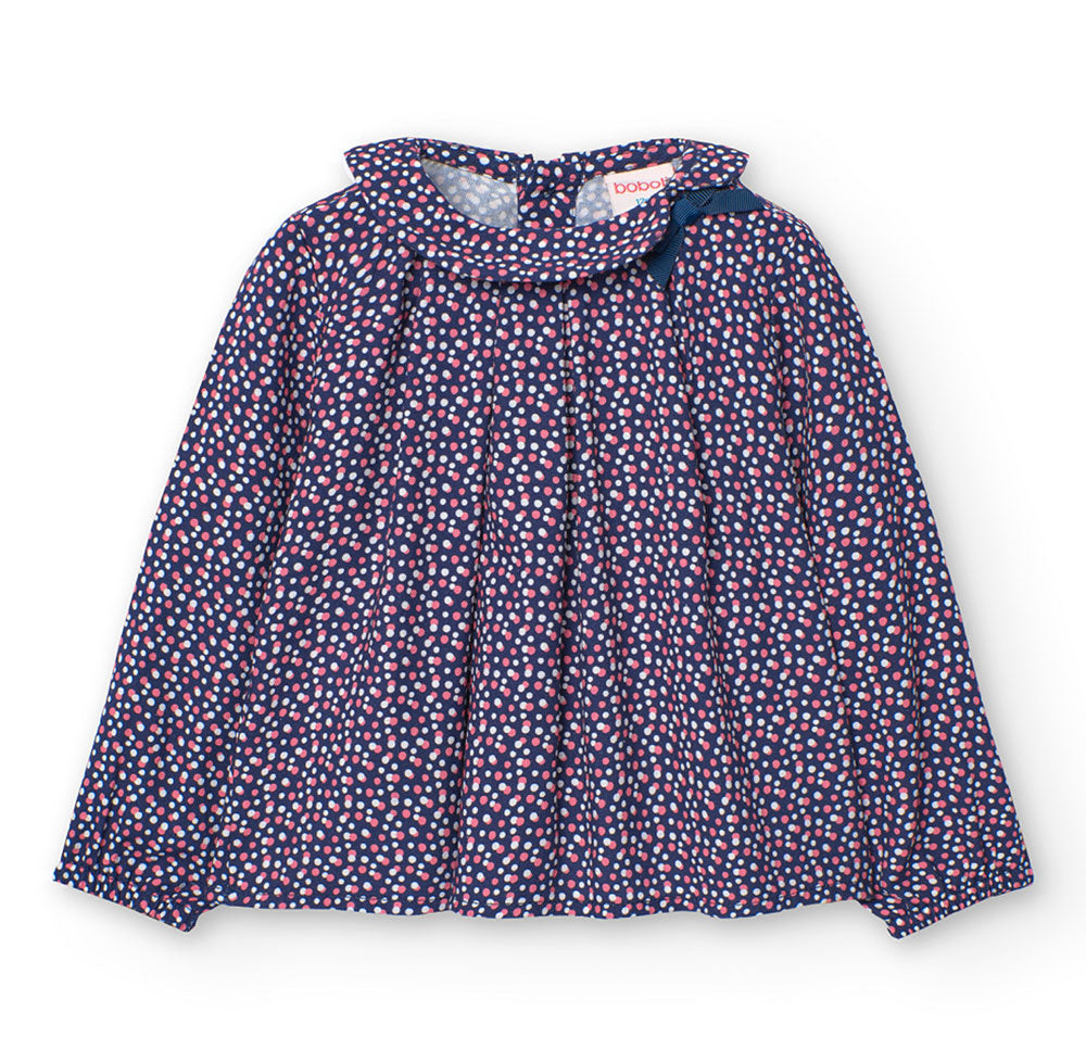 
Blouse from the Boboli Girl's Clothing Line, with round collar and micropois pattern. Opening at...