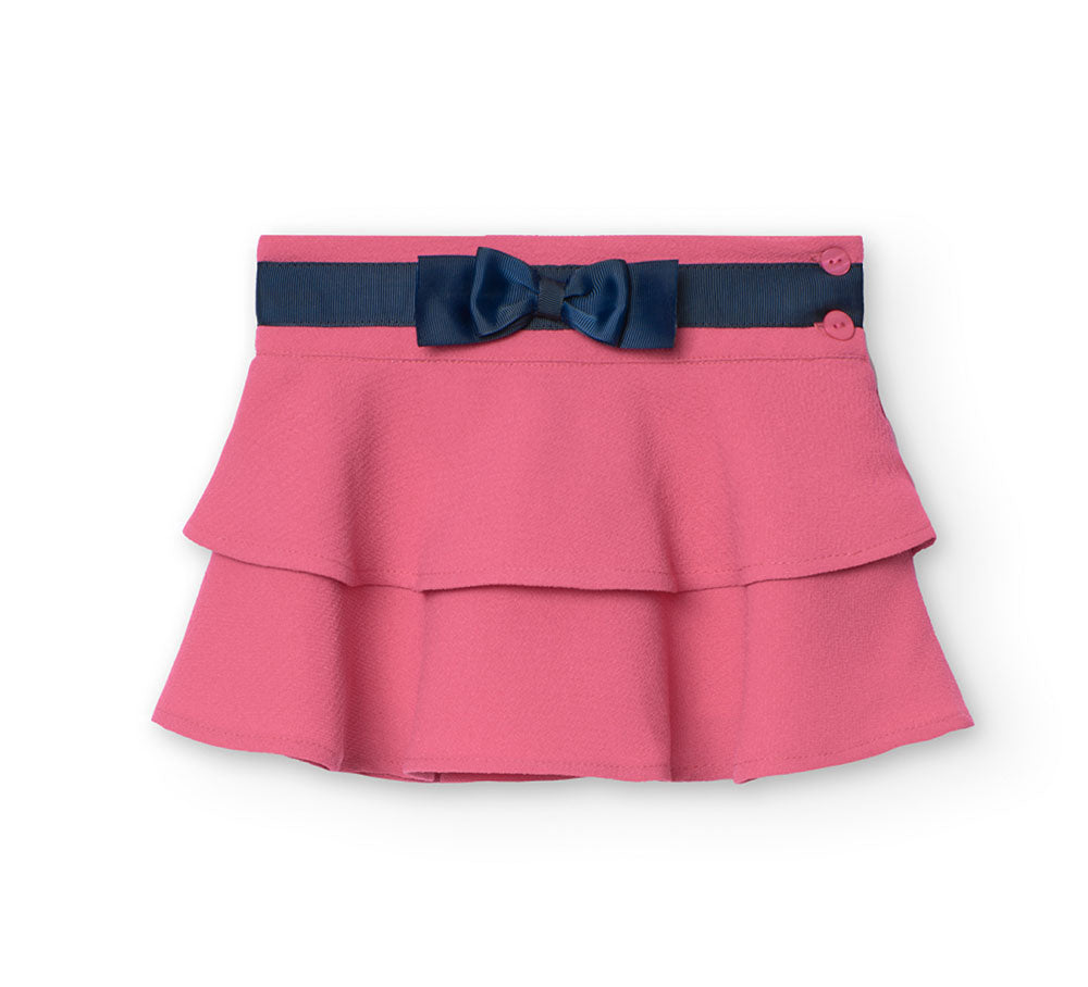 
Skirt from the Boboli Baby Girl Clothing Line, flounced with a bow at the waist and gros grein s...