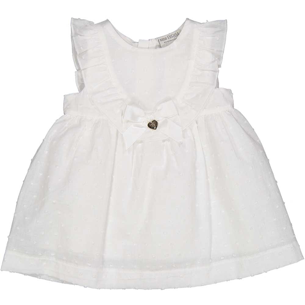 Dress from the Birba girls' clothing line, in light fabric with small embroideries. Curls on the ...