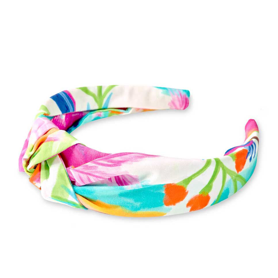 Headband from the Tuc Tuc girls' clothing line, lined with floral patterned fabric.
Composition: ...