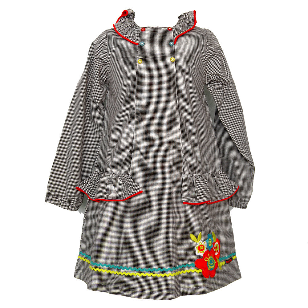 
  Dress from the Tuc Tuc girl's clothing line, with micro-squares pattern. Neck
  and sides with...