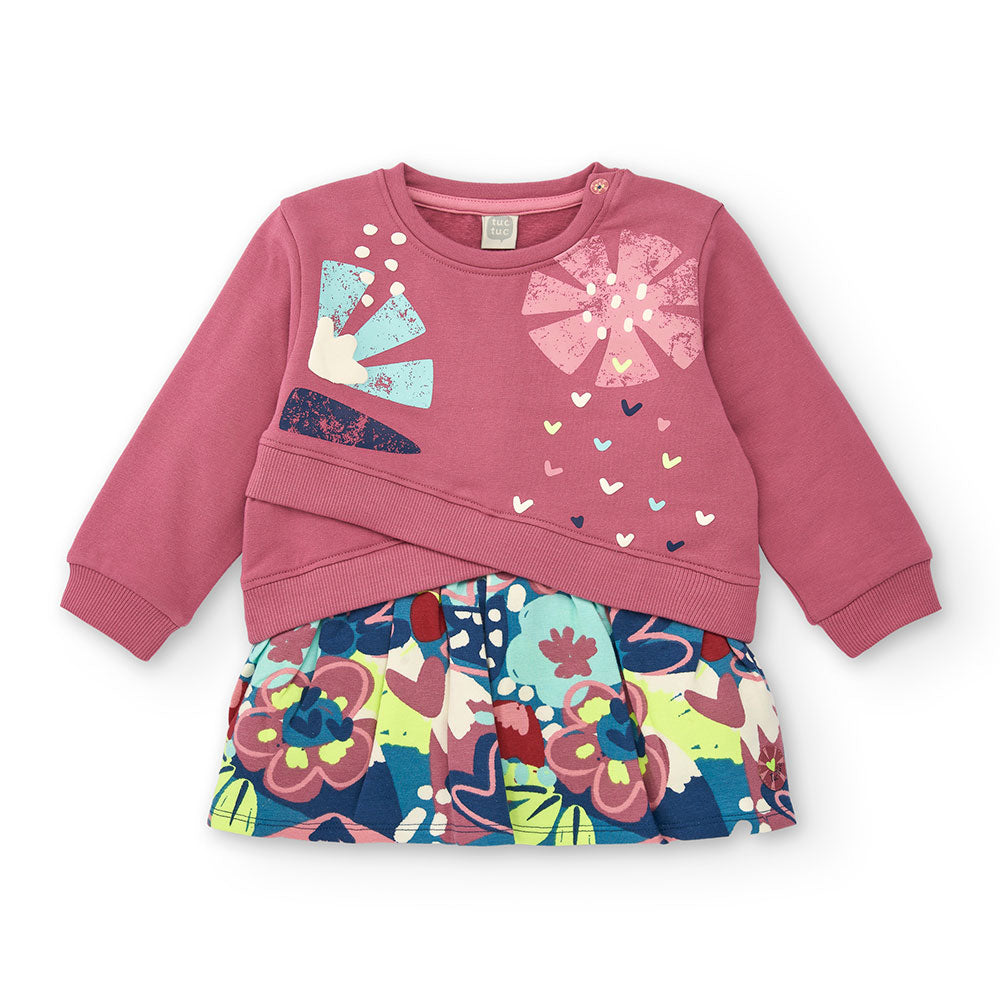 Little dress from Tuc Tuc Girl's Clothing Line, with crisscross pattern on the front, patterned s...