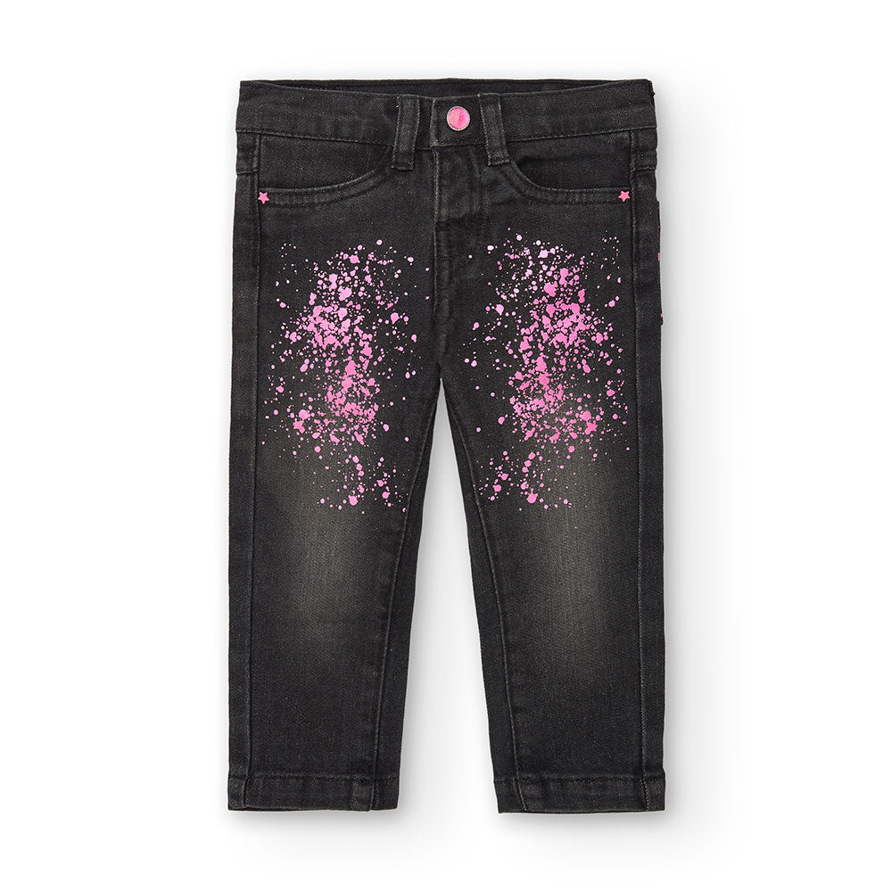 Jeans trousers from the Bambna Tuc Tuc clothing line, with a fluorescent print on the front on a ...